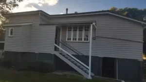 house with gray paint and stairs